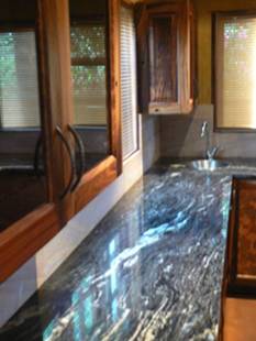 Cupboards by Divvie's Furniture and granite by Southern Granite